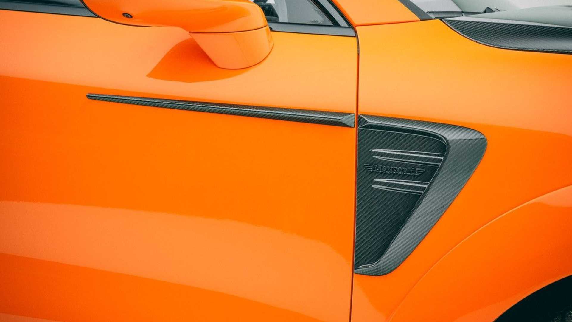 نمای بدنه بیرونی شاسی بلند پورشه کاین تیونینگ منصوری / Mansory Porsche Cayenne با طرح دو رنگ نارنجی و مشکی