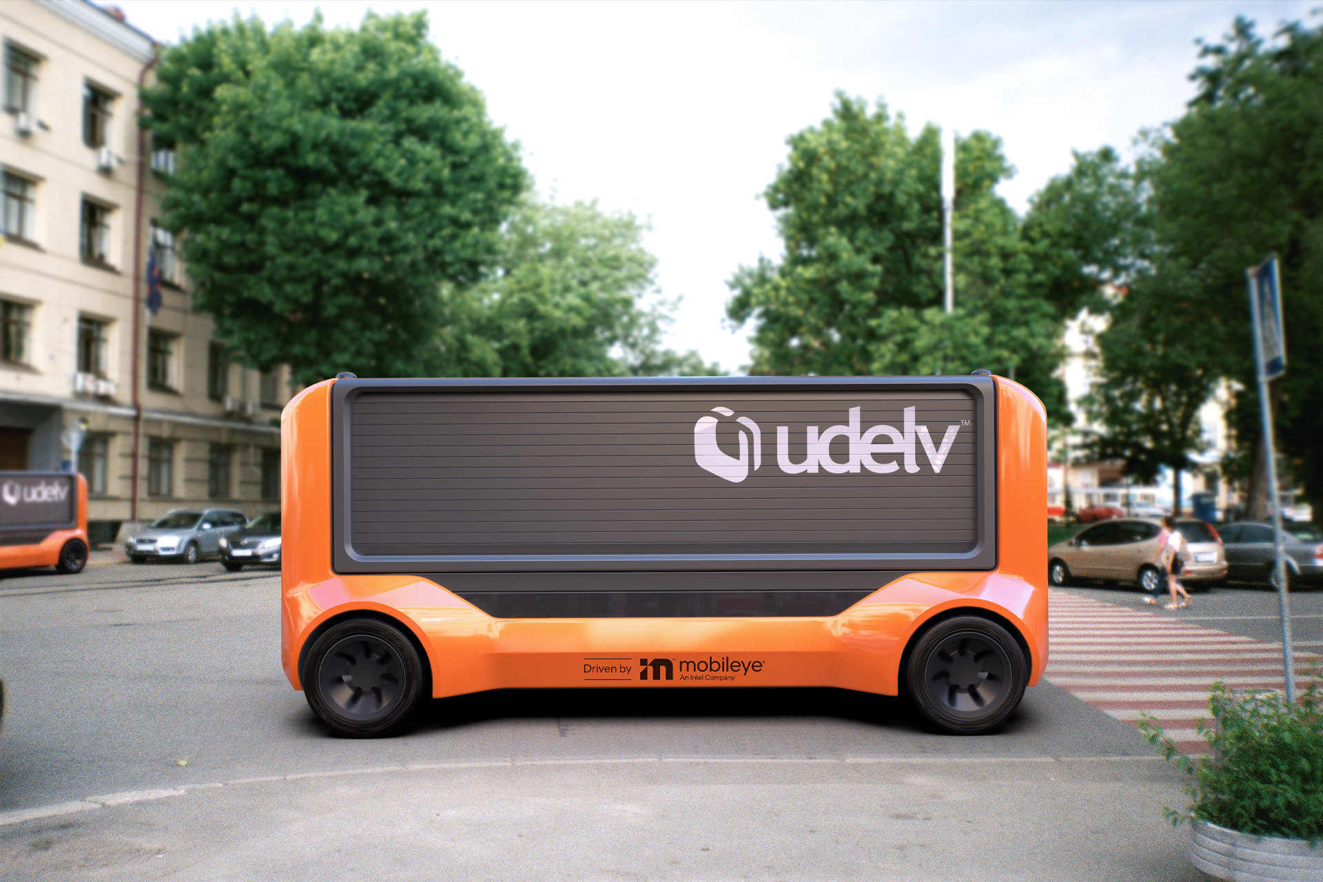 intel mobileye udlev transporter van graphic orange side view day - موبایل‌آی اینتل ون کاملا خودران تحویل کالا تولید می‌کند