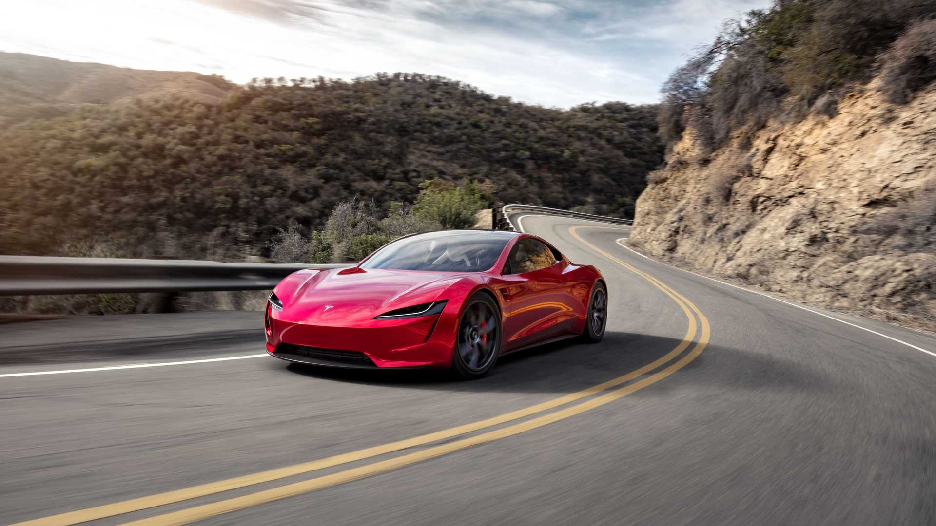 خودروی الکتریکی تسلا رودستر / Tesla Roadster قرمز رنگ در جاده
