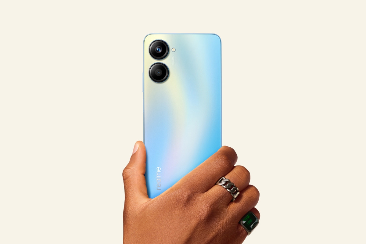 Realme 10 Pro phone in blue color in the right hand