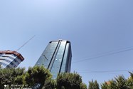 نمونه عکس ردمی نوت 9 اس - نمای فوق عریض ساختمان بلند